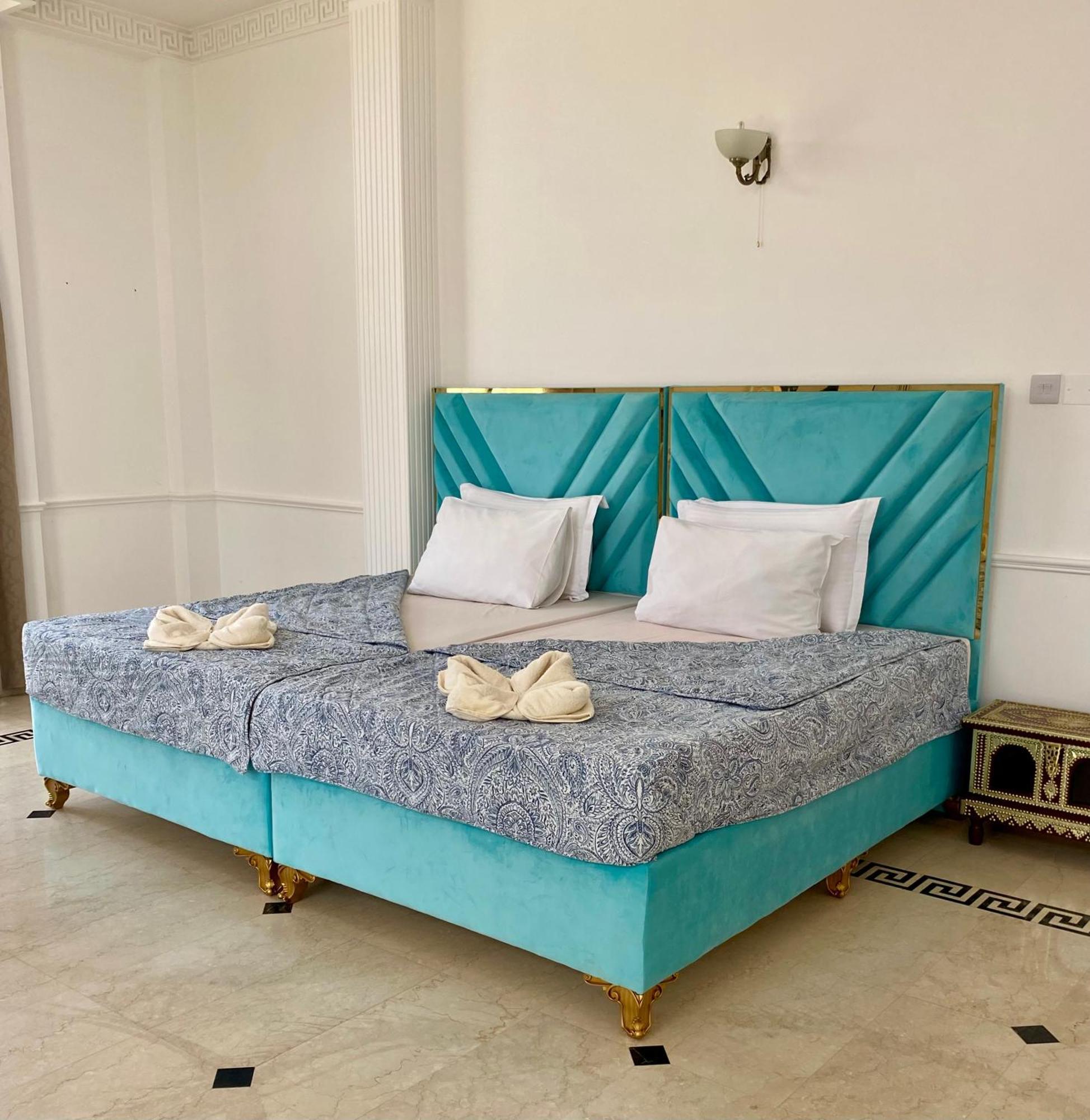 Arabian Nights Nook Hotel Muskat Bagian luar foto